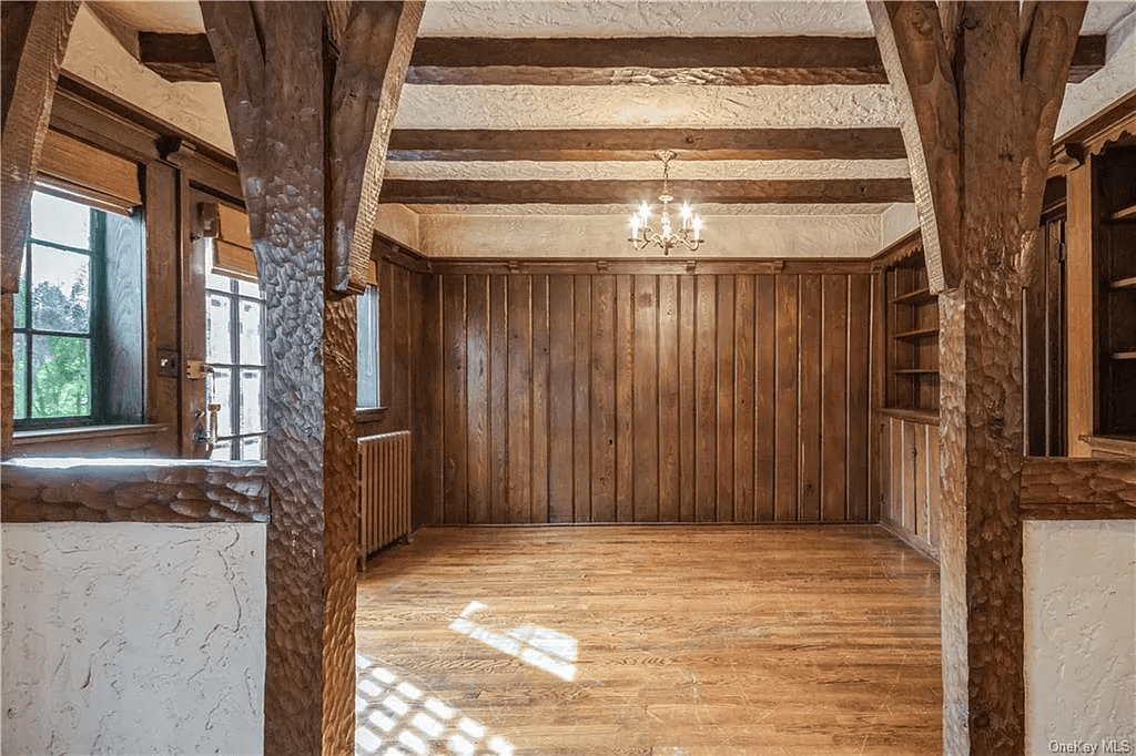 view into dining room with paneling