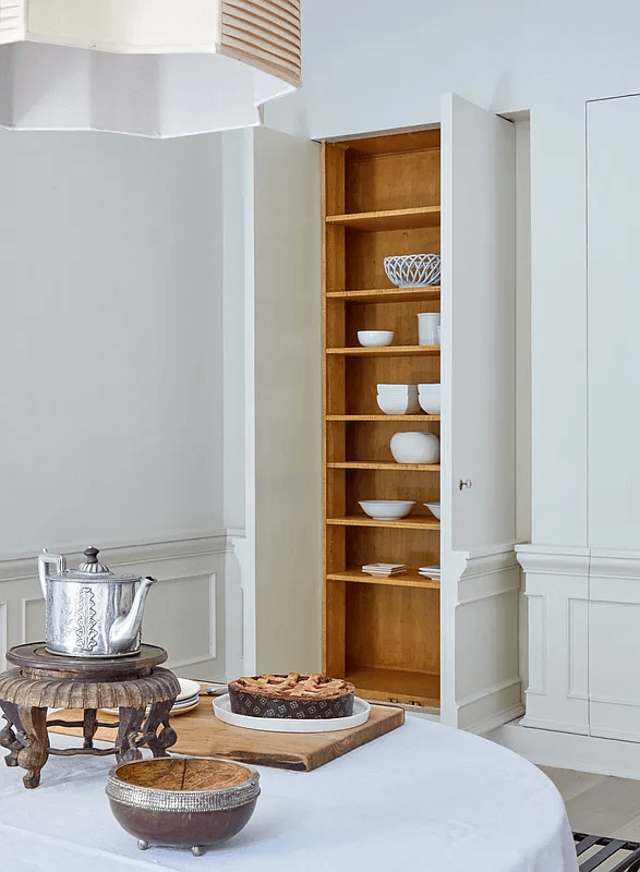 built-in storage in the dining area of the middle duplex
