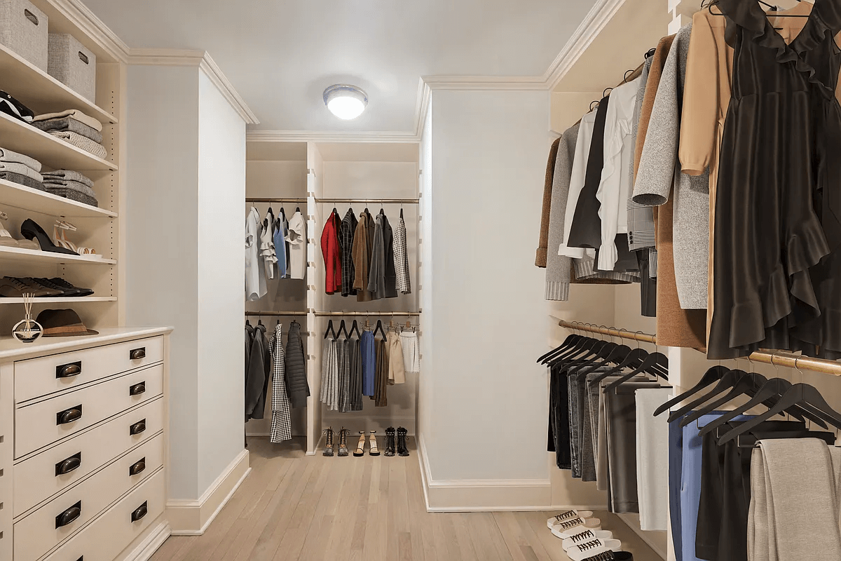 walk in closet and dressing area with built-in storage