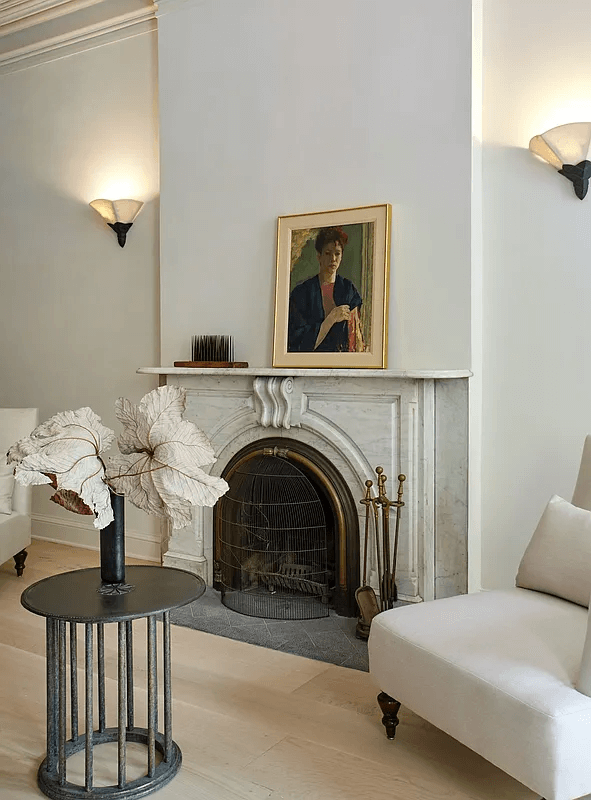 marble mantel in living room of duplex