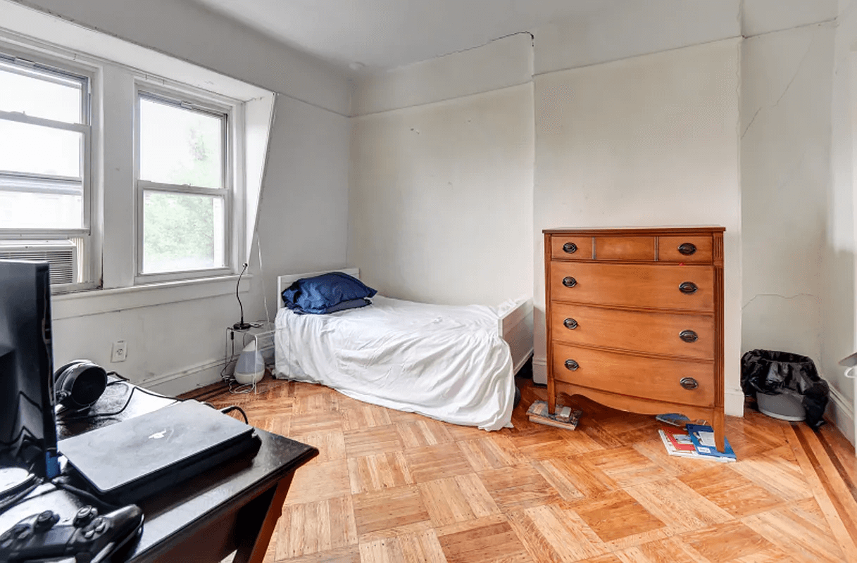 bedroom with wood floors