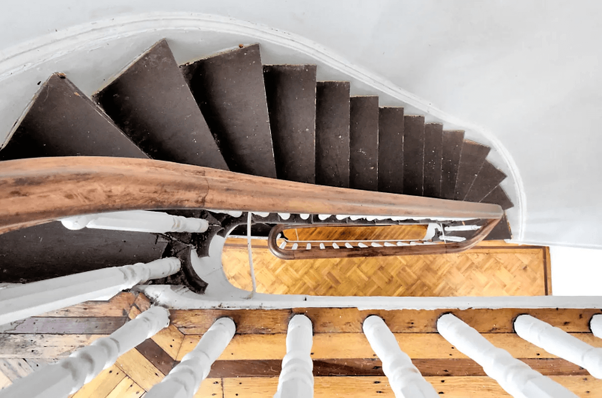 view down curving staircase