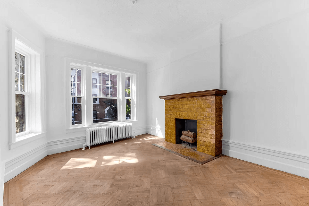 crown heights - living room with tile mantel and picture rails