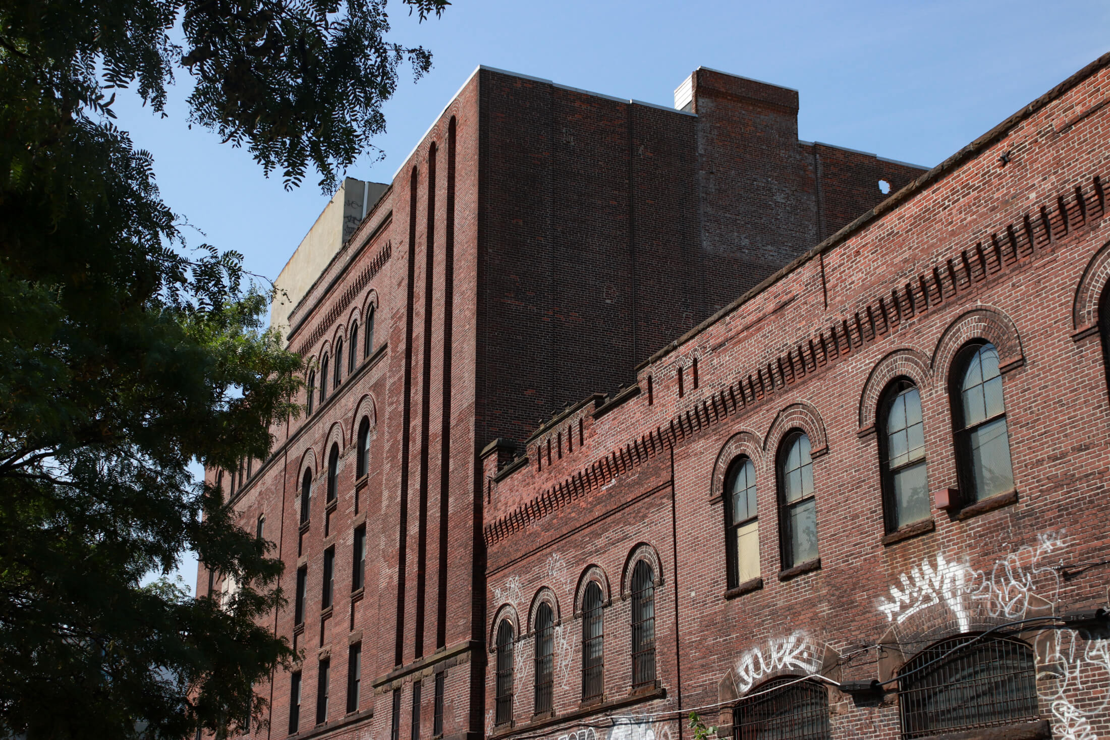 arched windows of the brick factory building