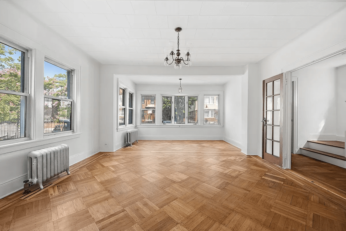 cypress hills - living room with french doors to staircase