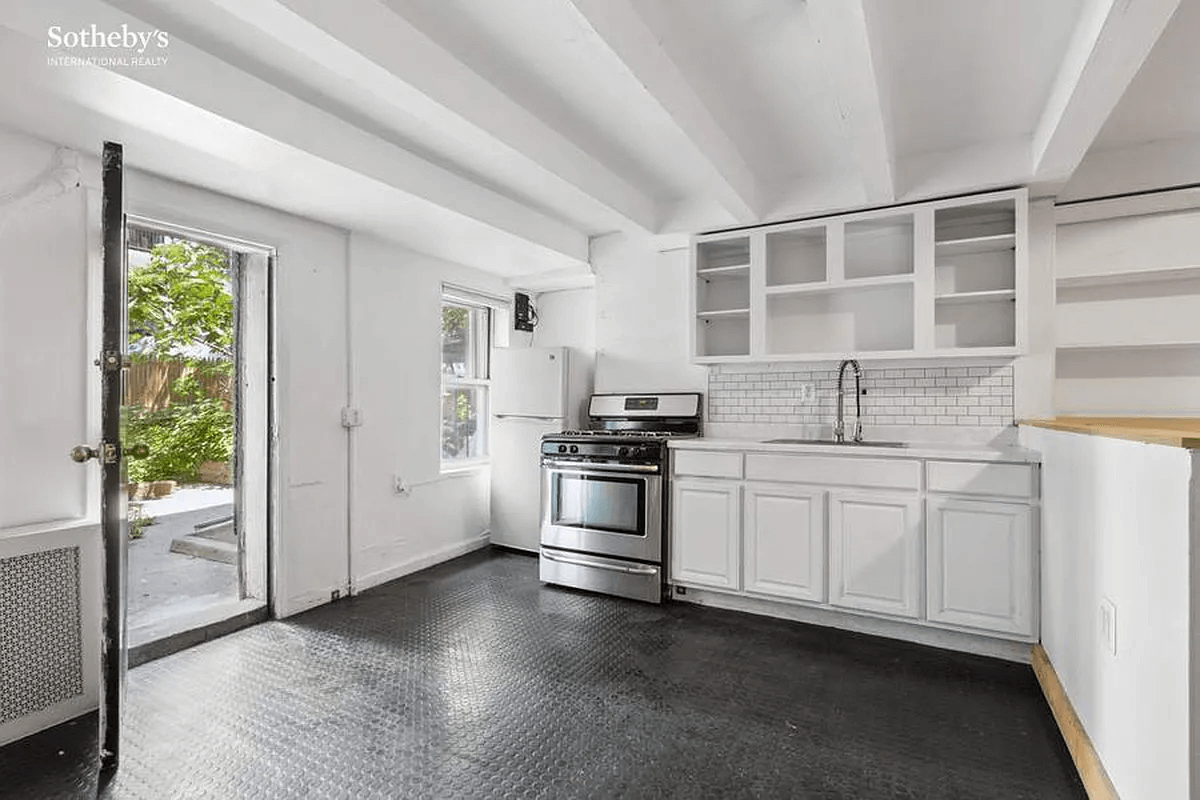 kitchen with dark floor tile