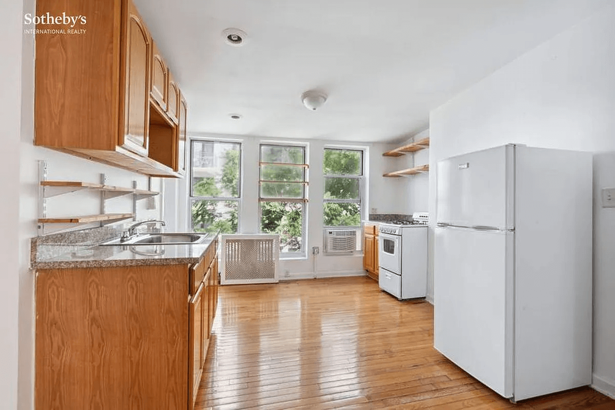 kitchen with wood cabinets and floors