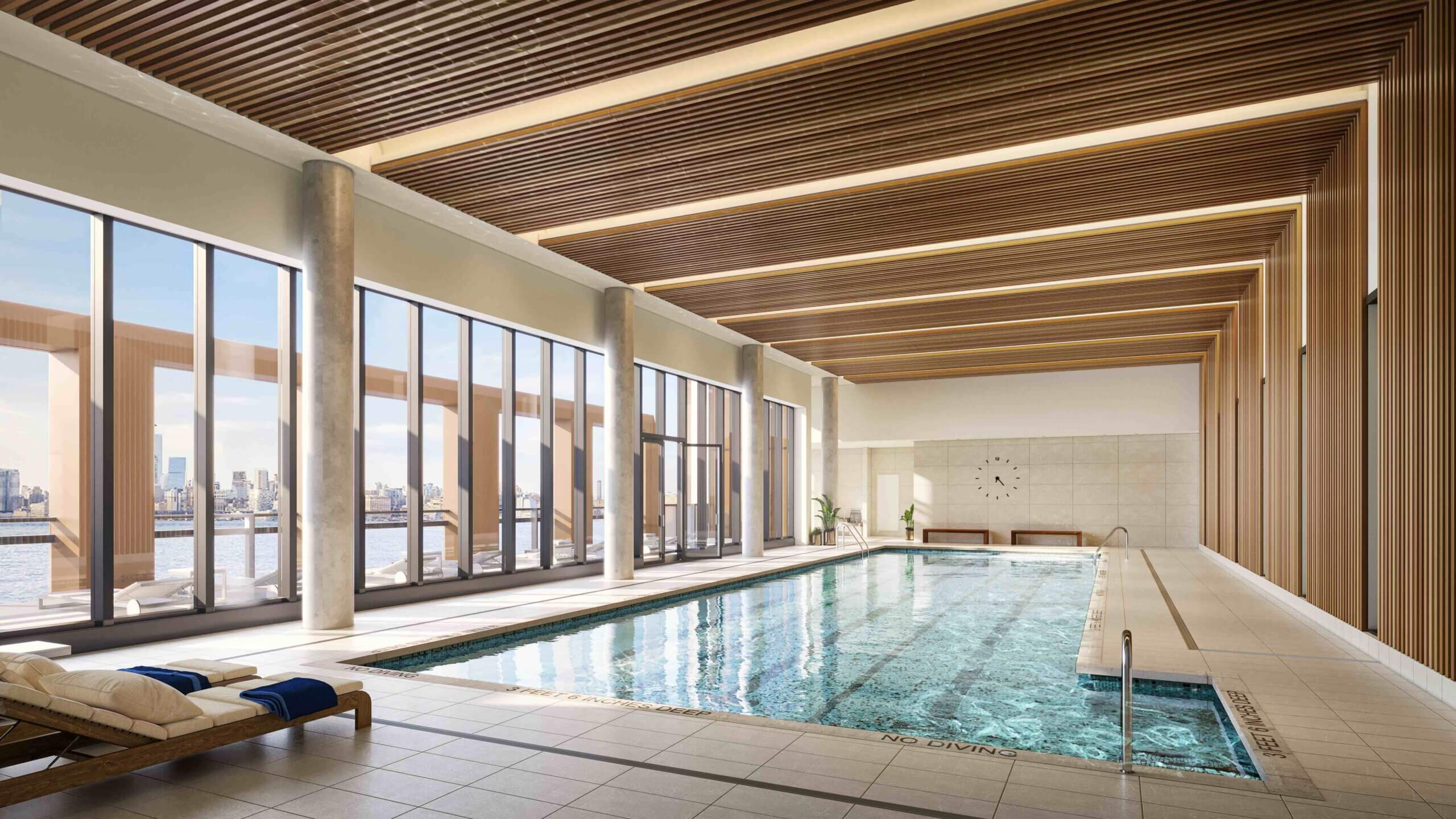 indoor pool with a skyline view