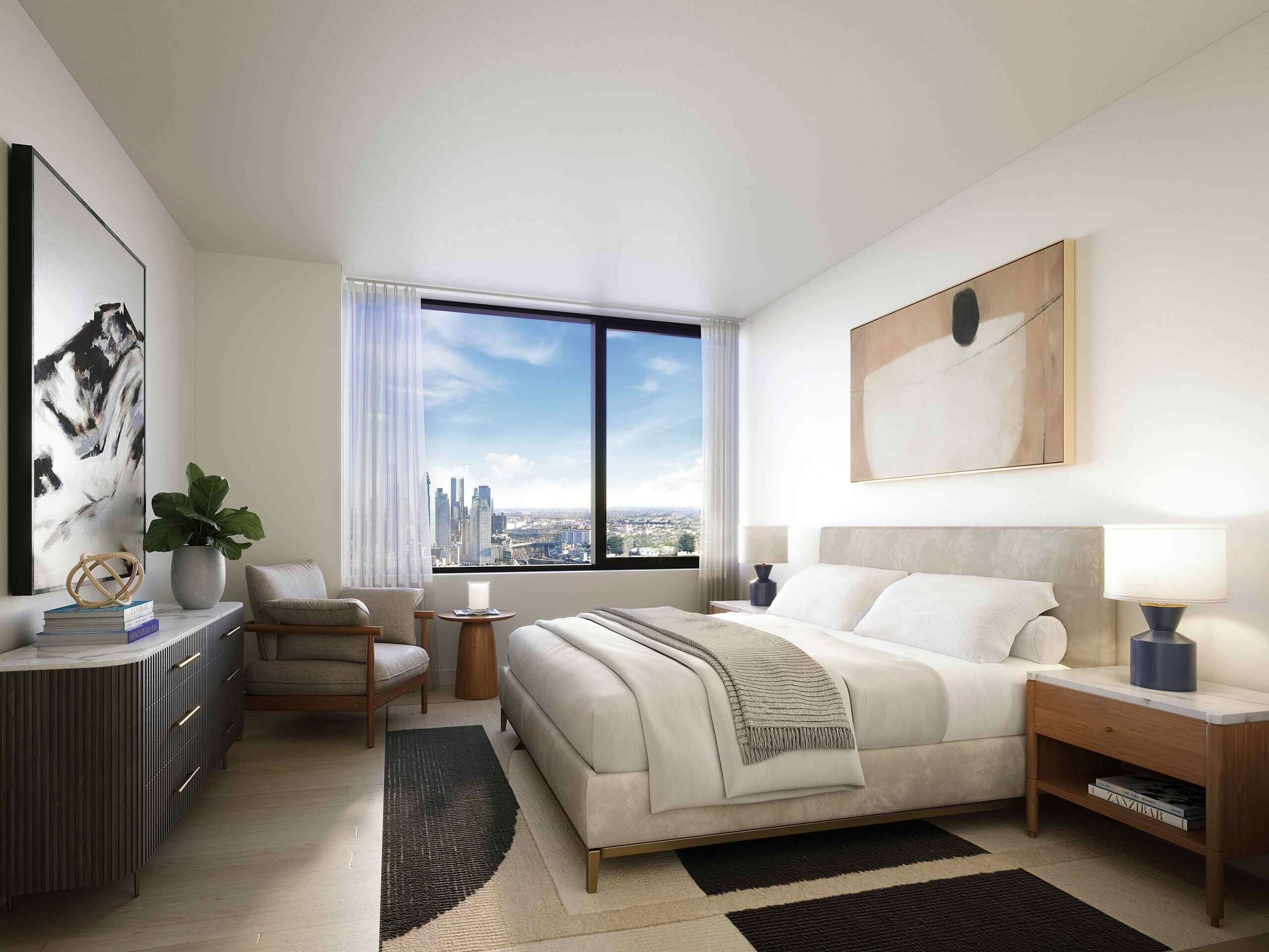 bedroom with window and view of skyline