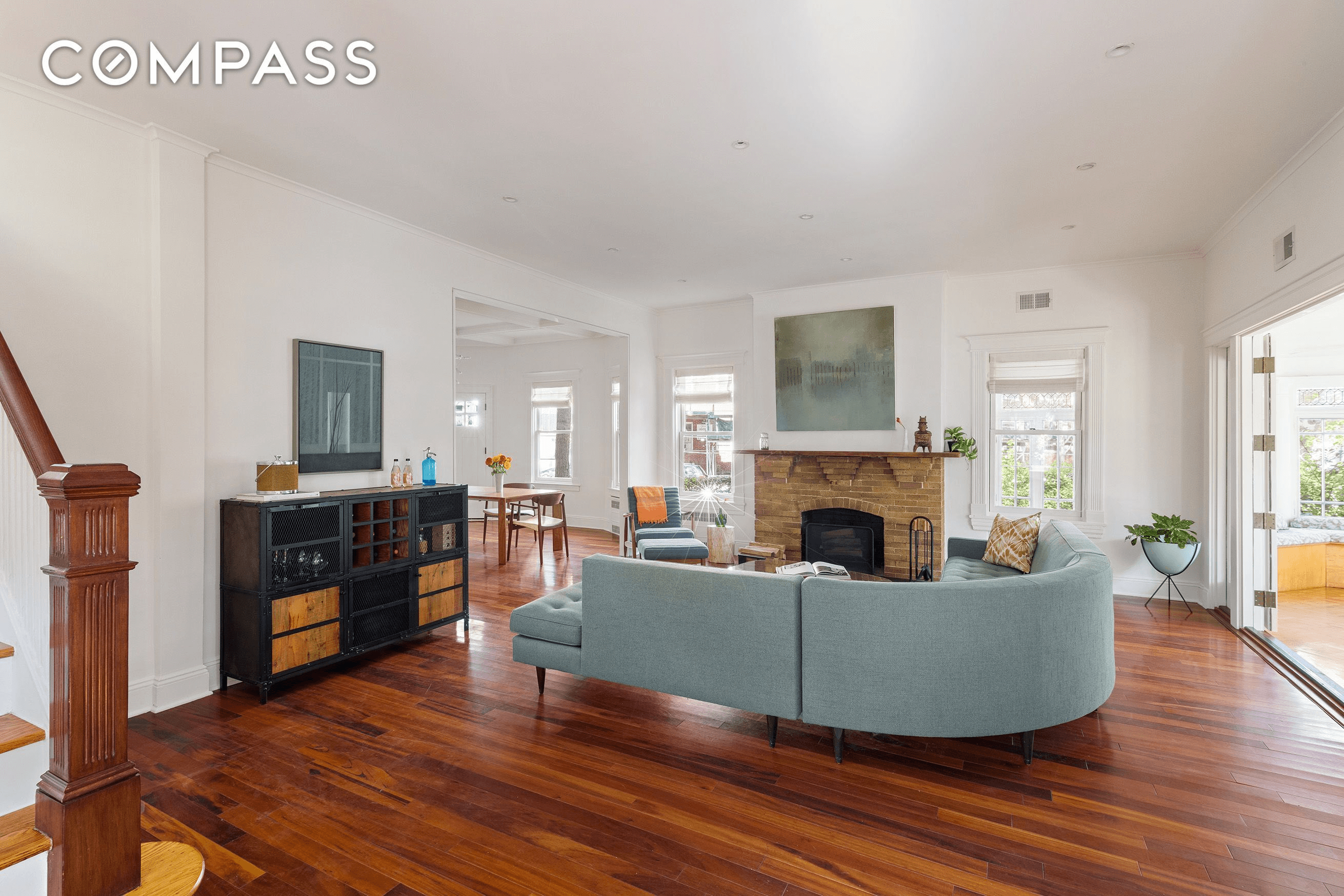 living room with brick mantel