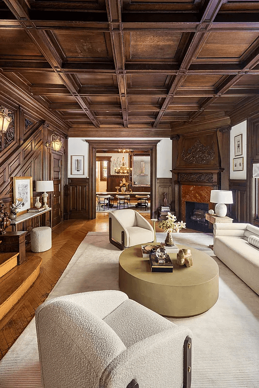 wood filled middle parlor with wainscoting, coffered ceiling, original stair