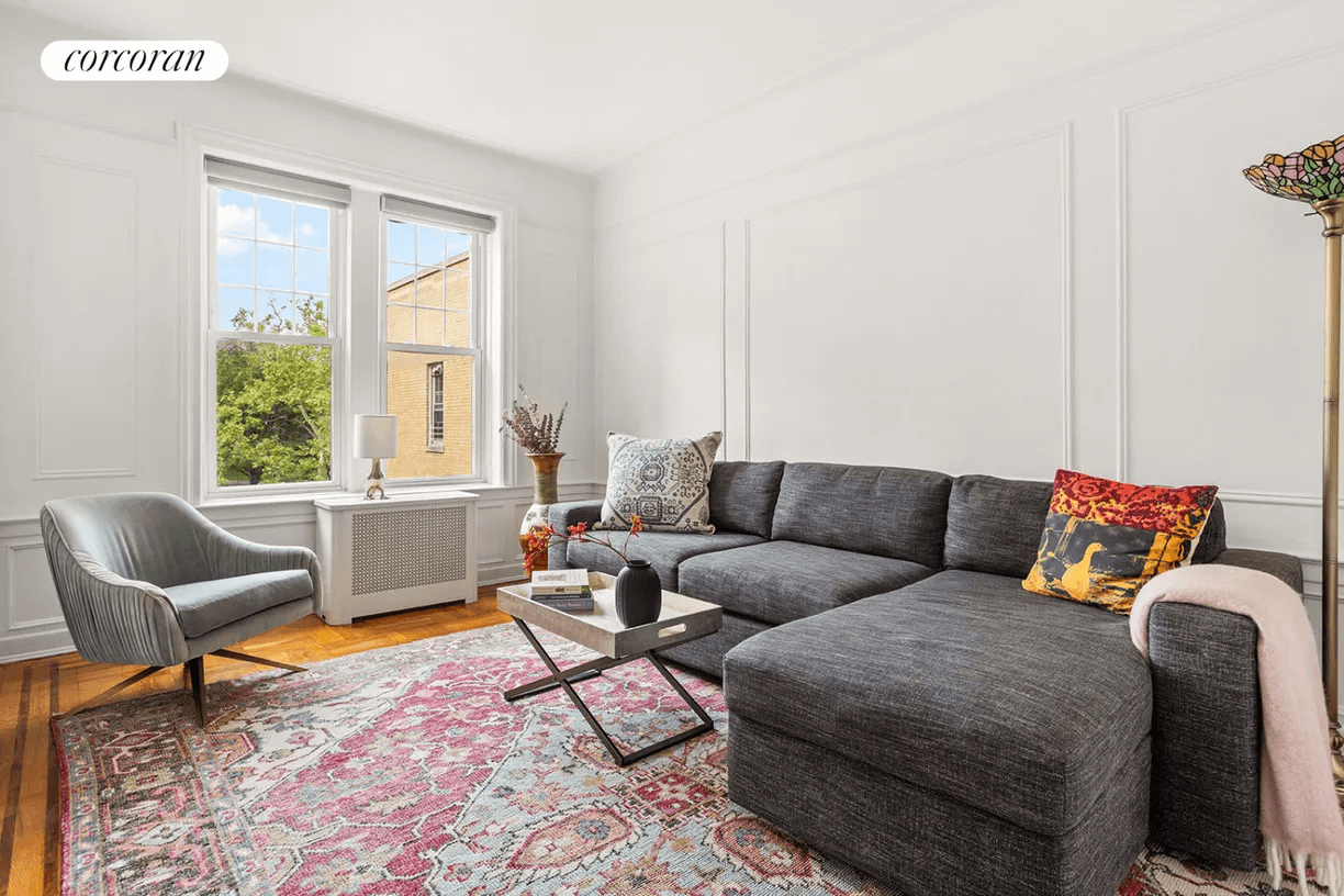 sunset park - living room with wall moldings, picture rails and a windwo