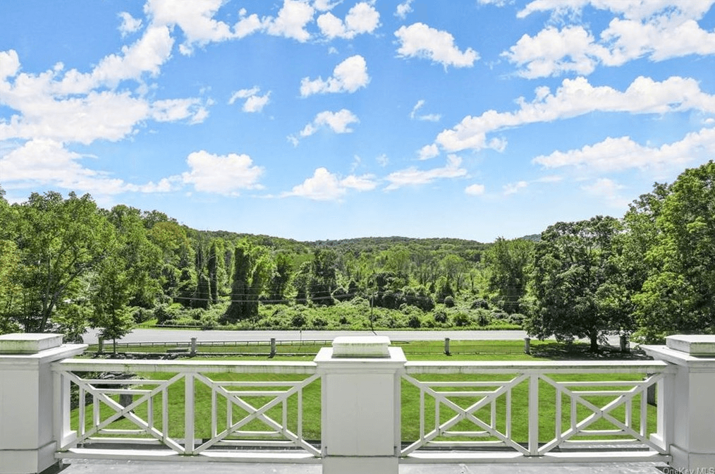 view from portico to the wooded view across the street