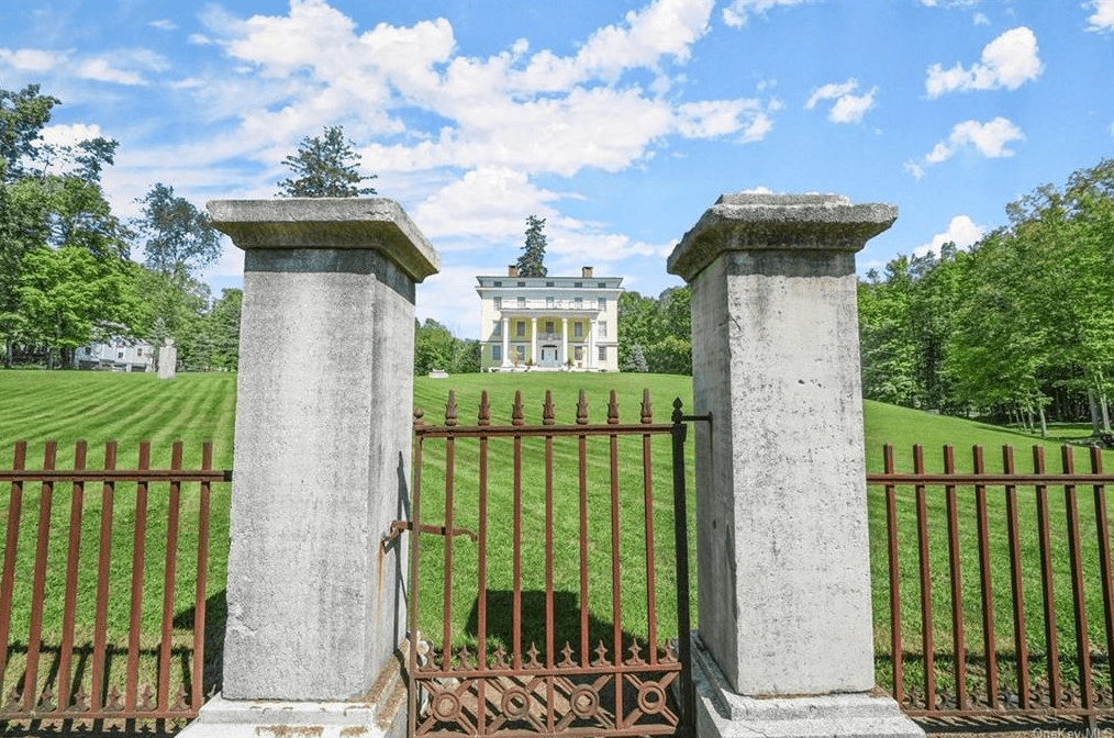 view through fence towards the house