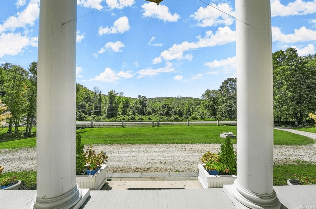 view from portico to the wooded view across the street