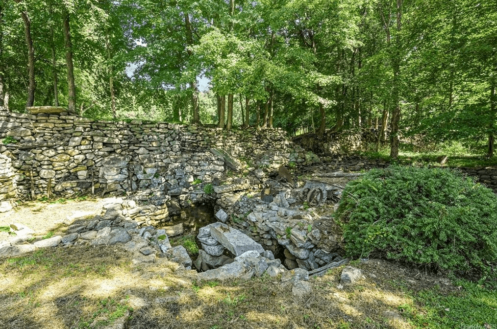 view of rubble stone walls