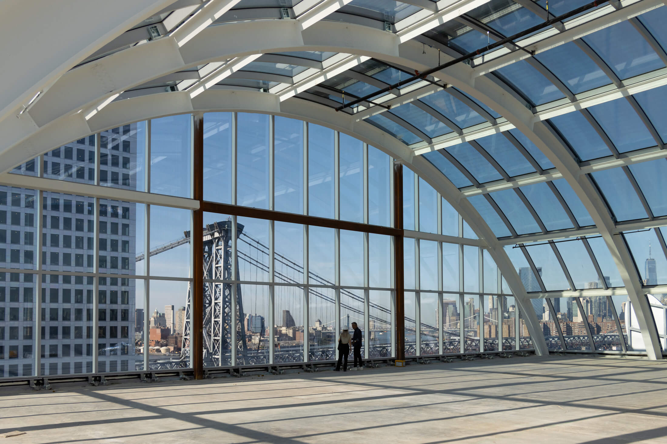 glass domed penthouse with a view of the williamsburg bridge