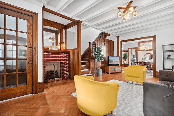 living room with brick mantel