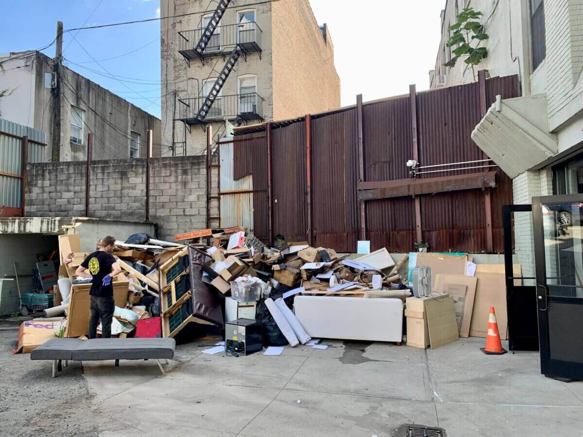 storm damaged materials piled up