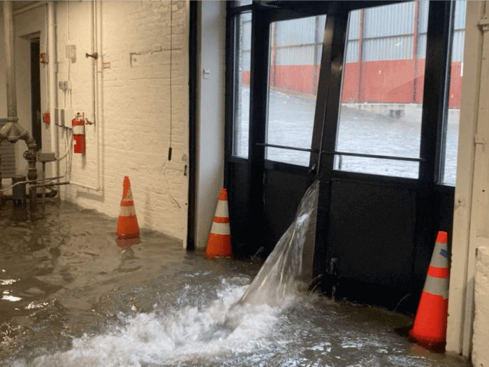 arts gowanus doors with water rushing in