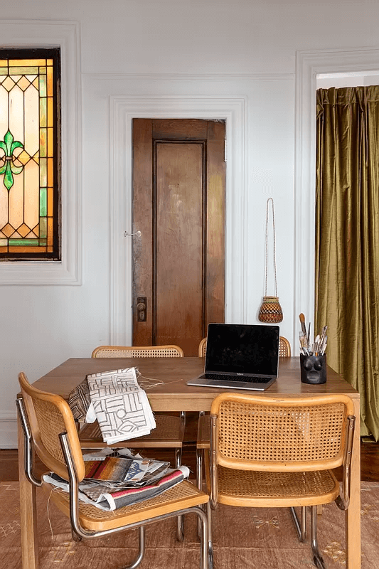 dining room with a stained glass window