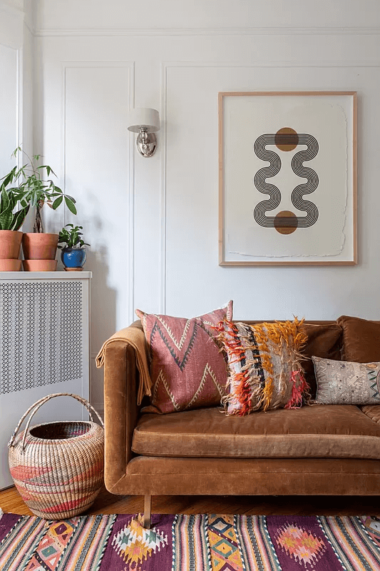 living room with wall moldings and white walls