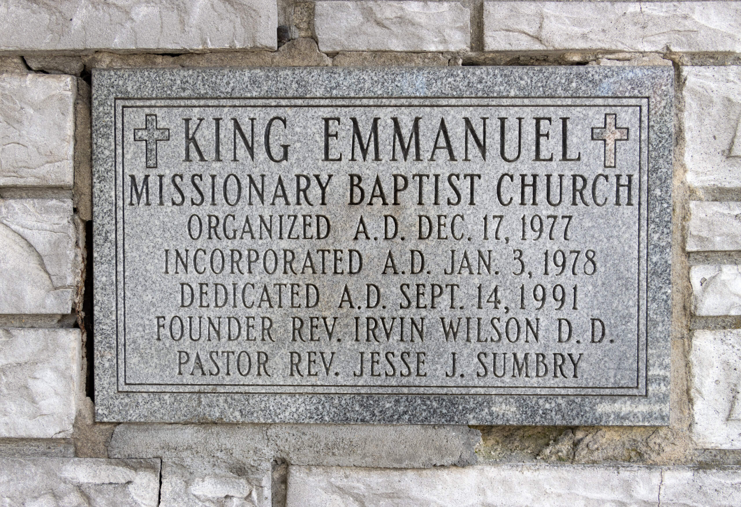 cornerstone noting the dedication date for the king emmanuel missionary baptist church in 1991