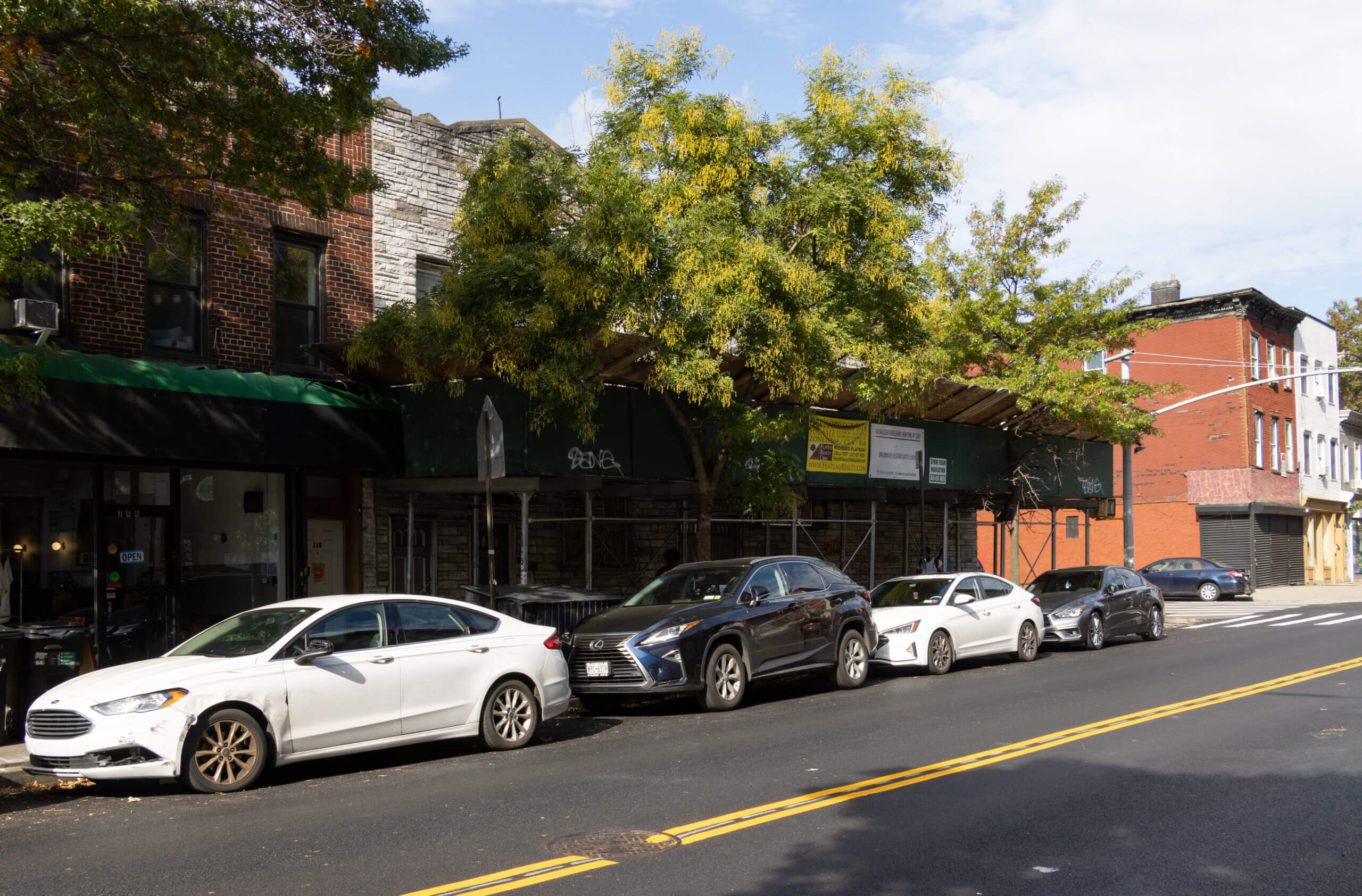 view on malcolm x toward bainbridge street showing the sidewalk shed