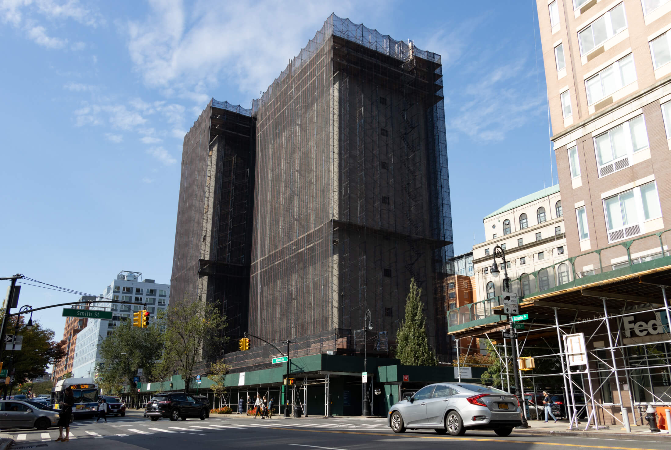 view of the scaffolded jail on atlantic avenue looking toward boerum place
