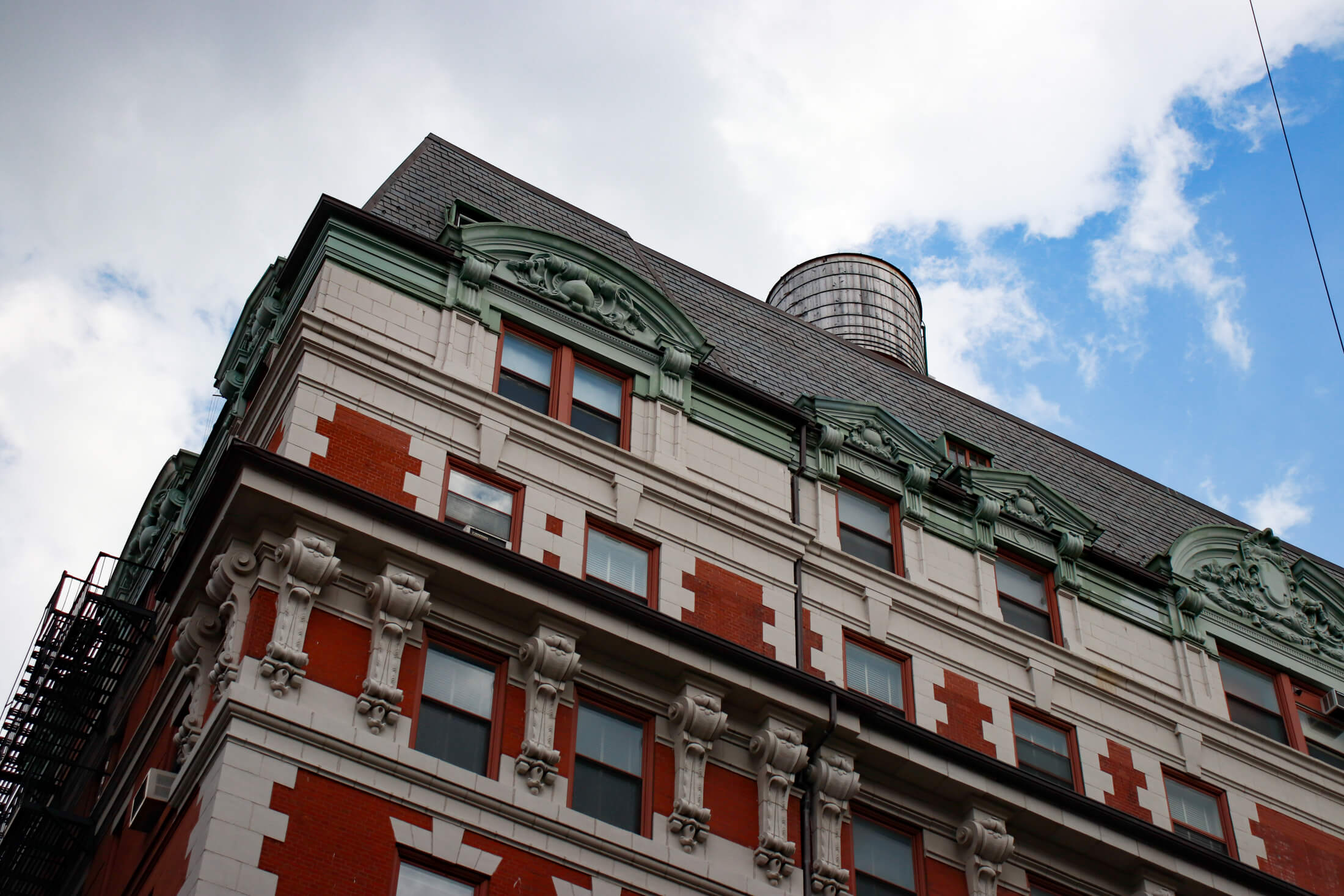brooklyn heights - view of a ornamental cornice and a water tower atop a building