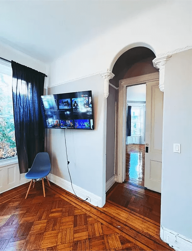 bedroom with arched doorway