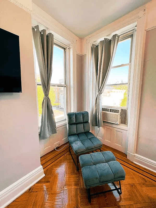 bedroom nook with corner windows