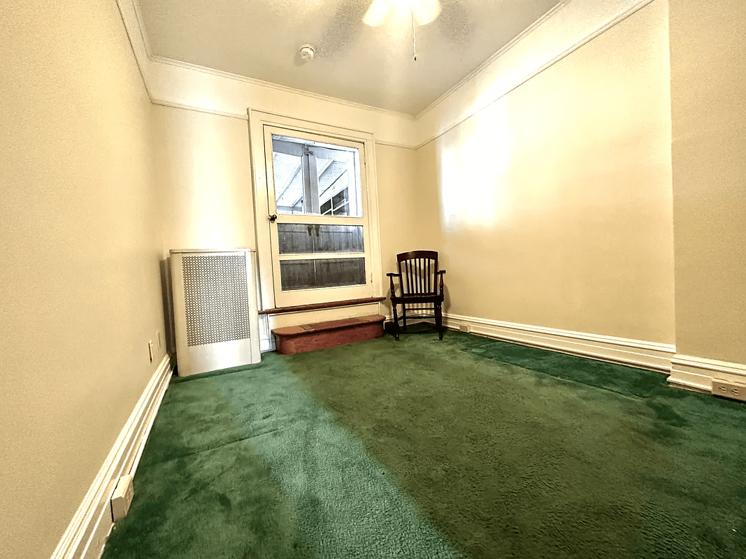 bedroom with green carpet