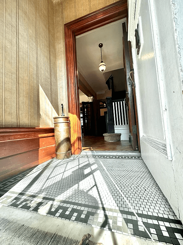 vestibule with black and white tile