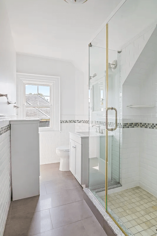 bathroom with shower with glass doors