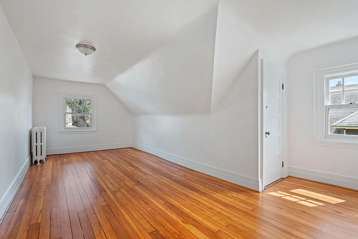 top floor bedroom with sloped ceiling