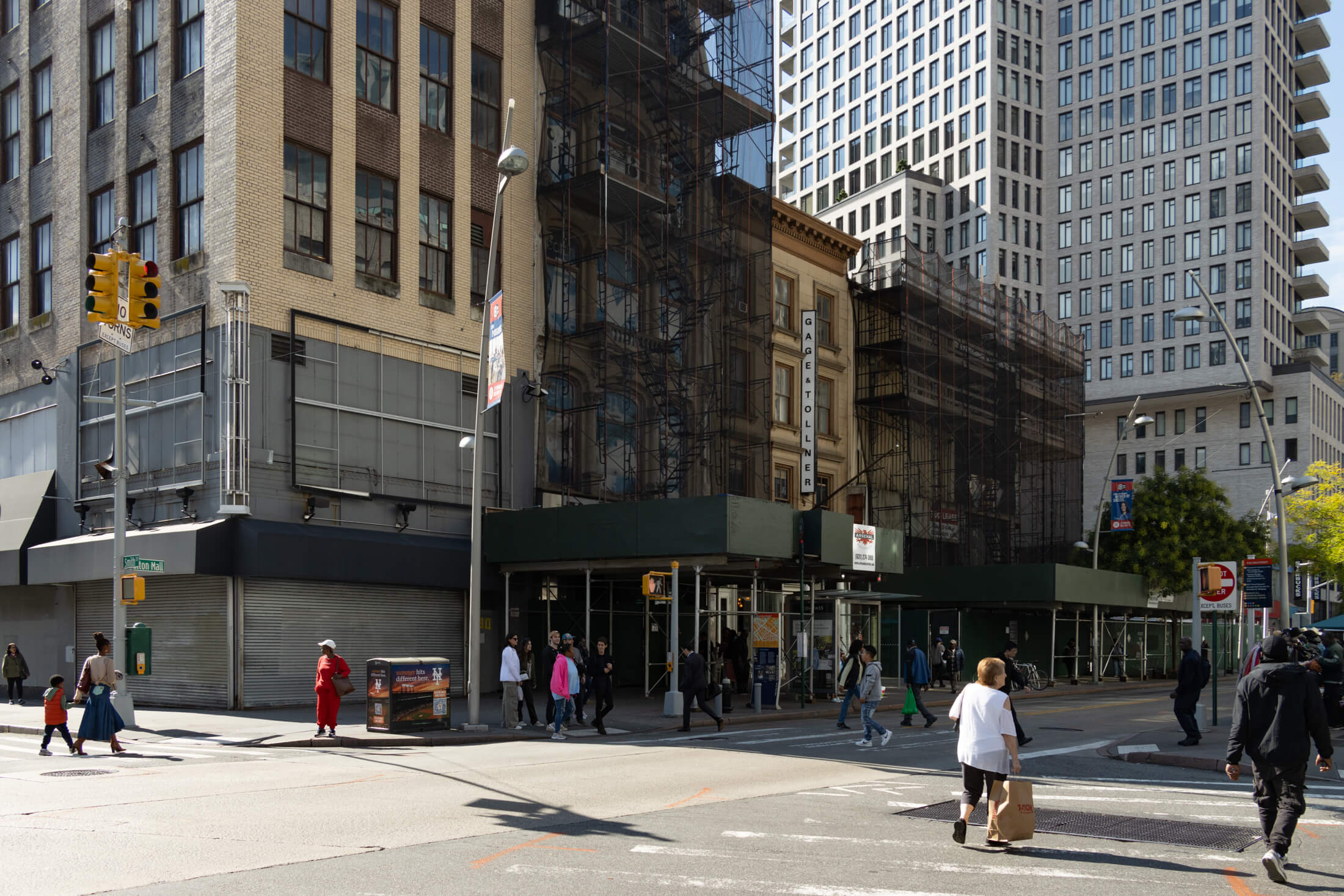 downtown brooklyn - buildings on either side of gage and tollner under scaffolding