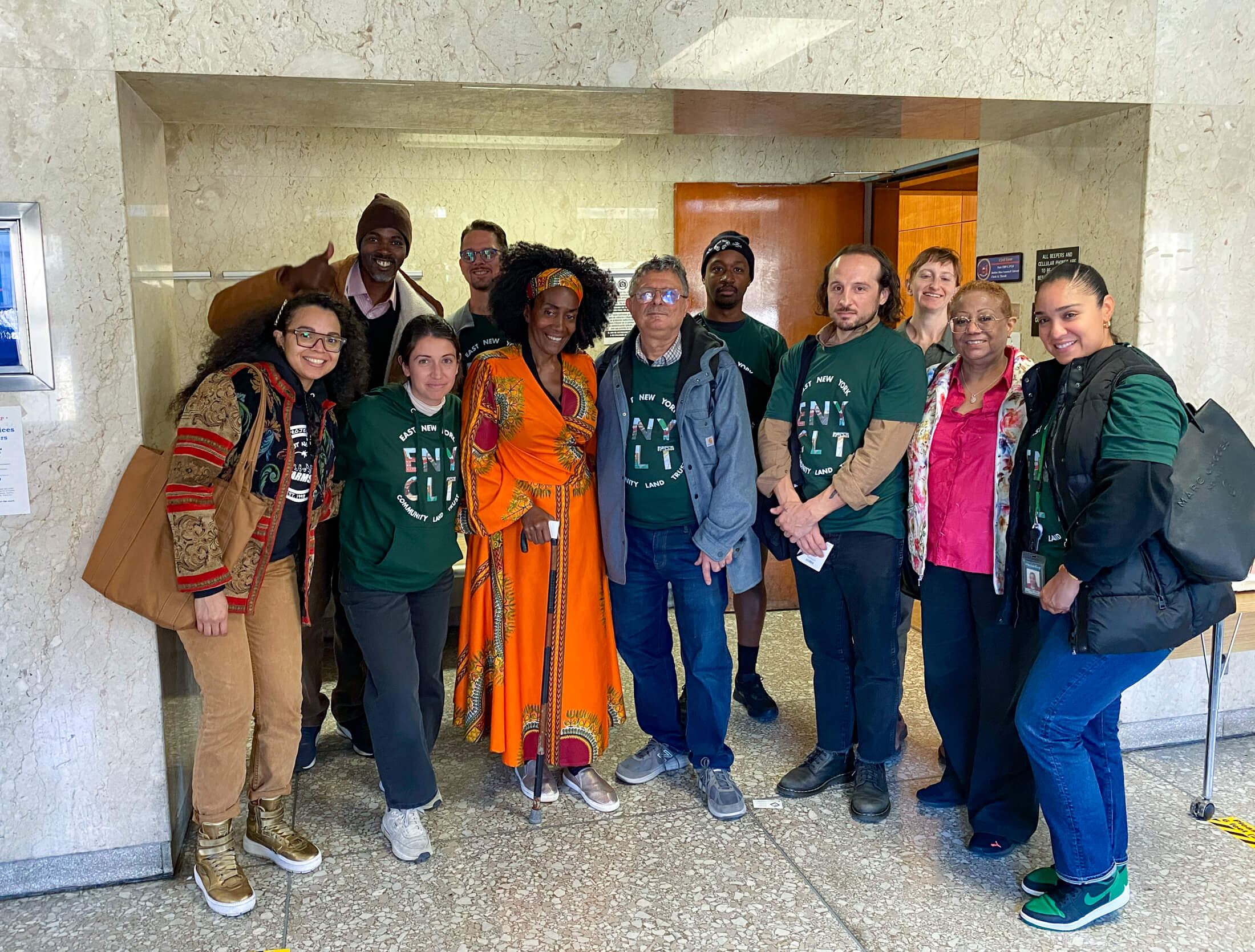 tami green and a group of supporters at the court