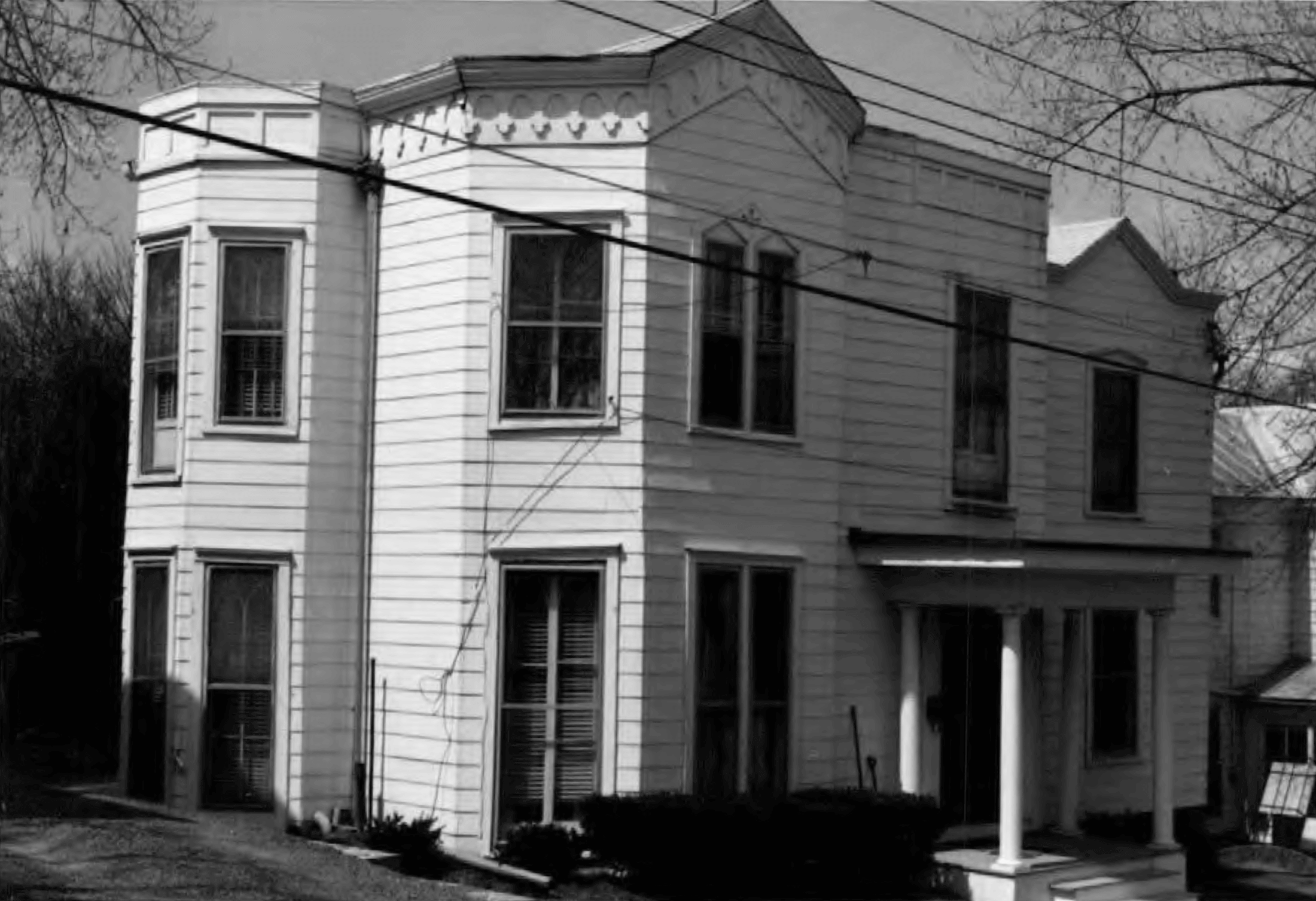 a black and white photo of the house