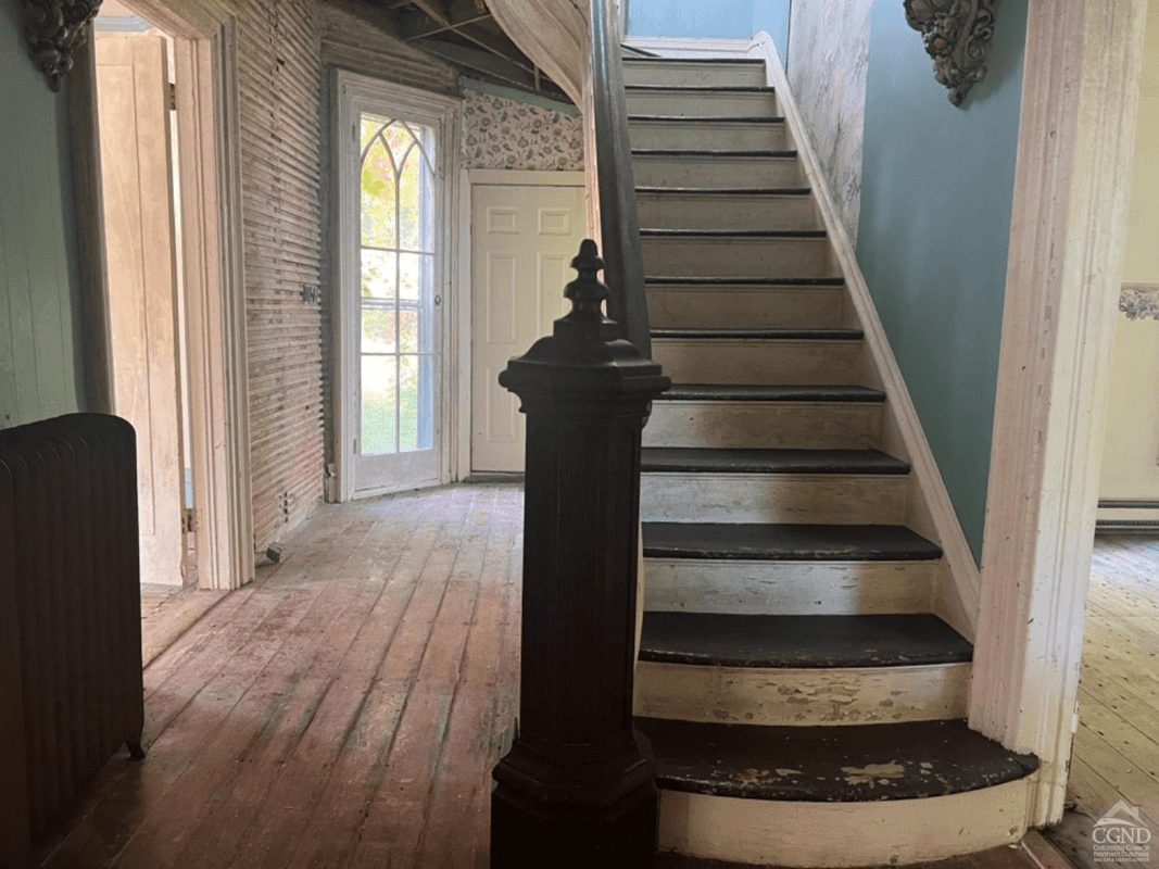 staircase with original heavy newel post