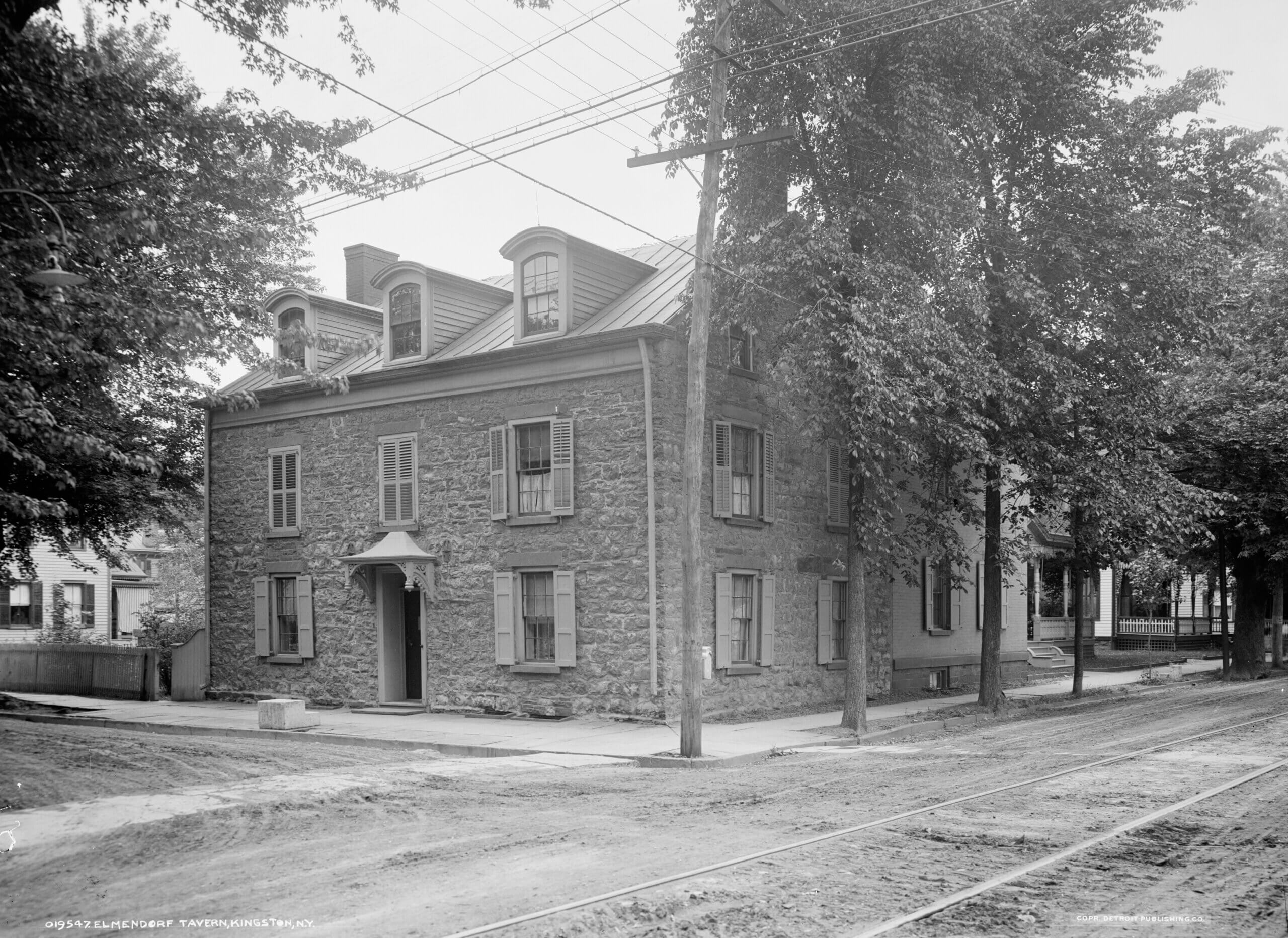 black and white photo of the stone house