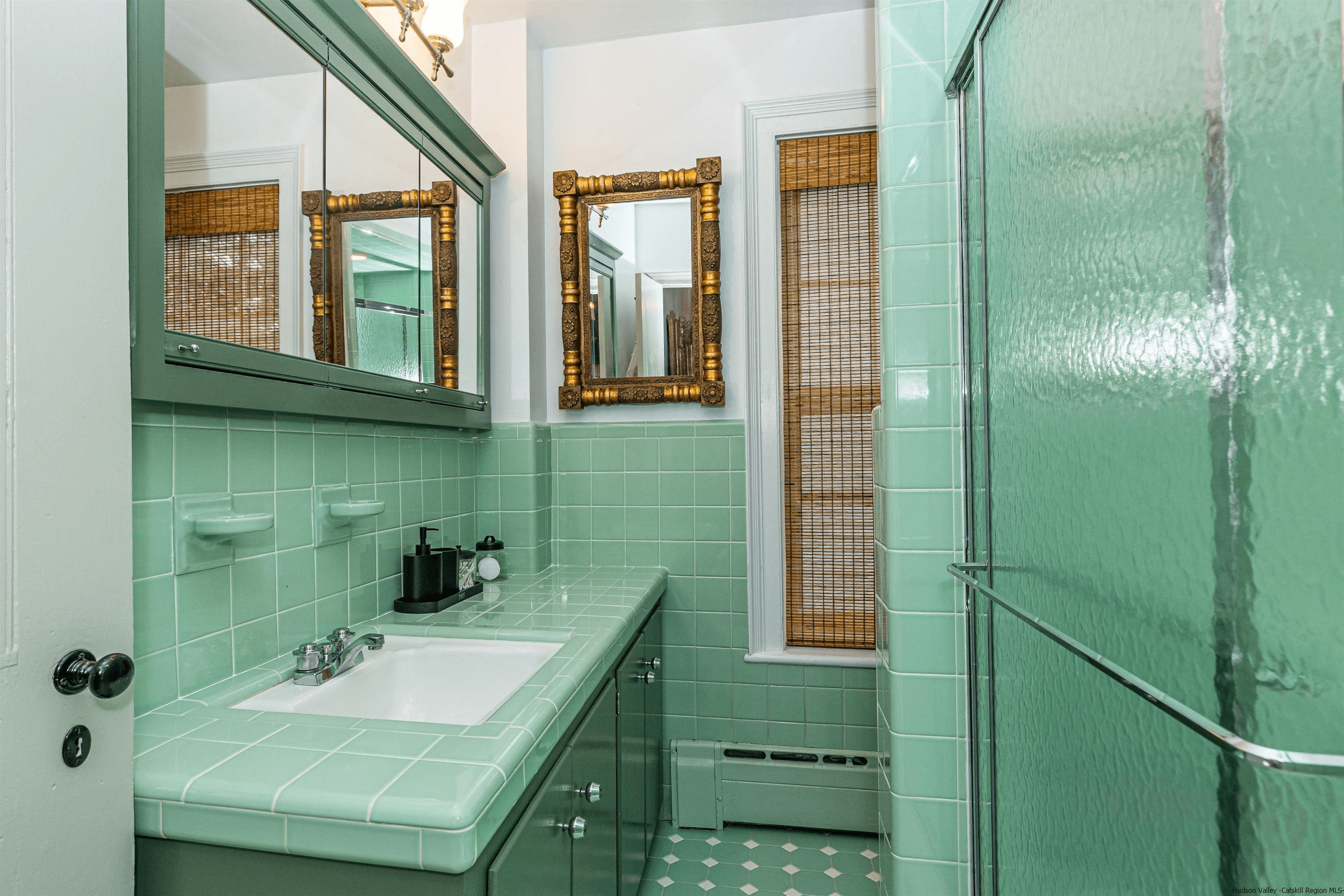 bathroom with vintage green tiles