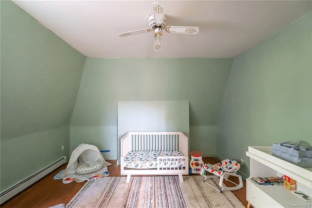 bedroom with baseboard heating