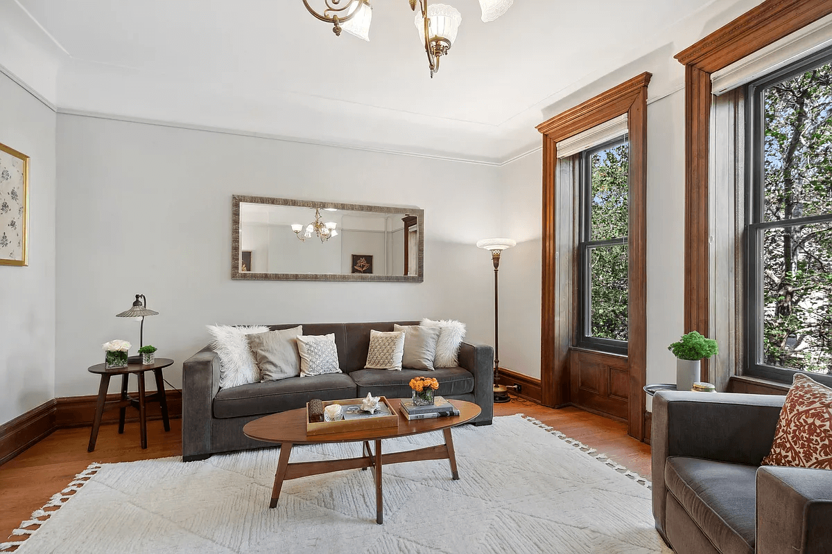 living room with picture rails and wood floors