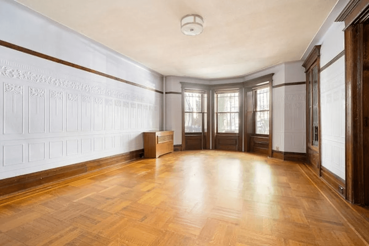 garden level with bay window, built-ins and wood floor