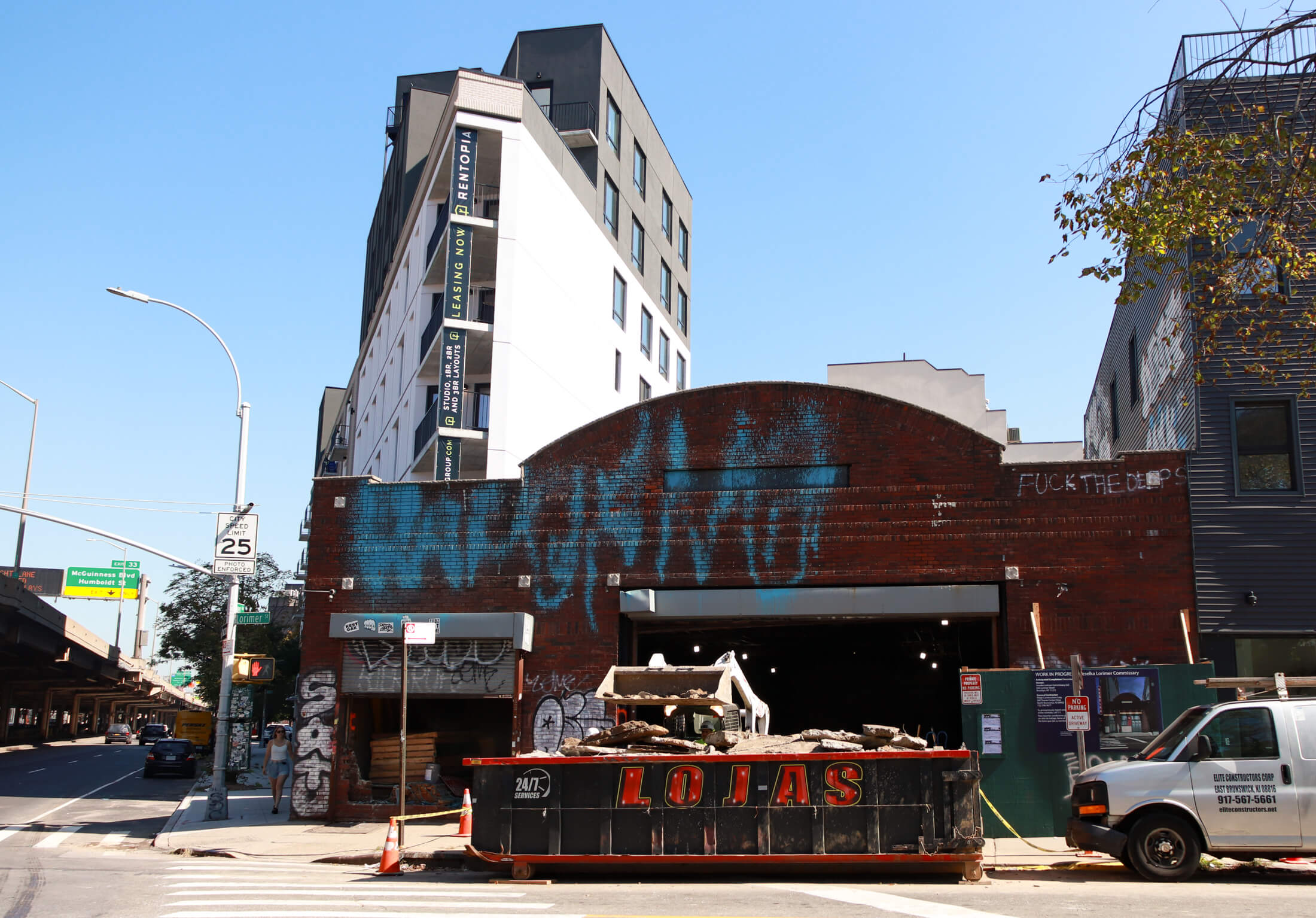 dumpster in front of the building