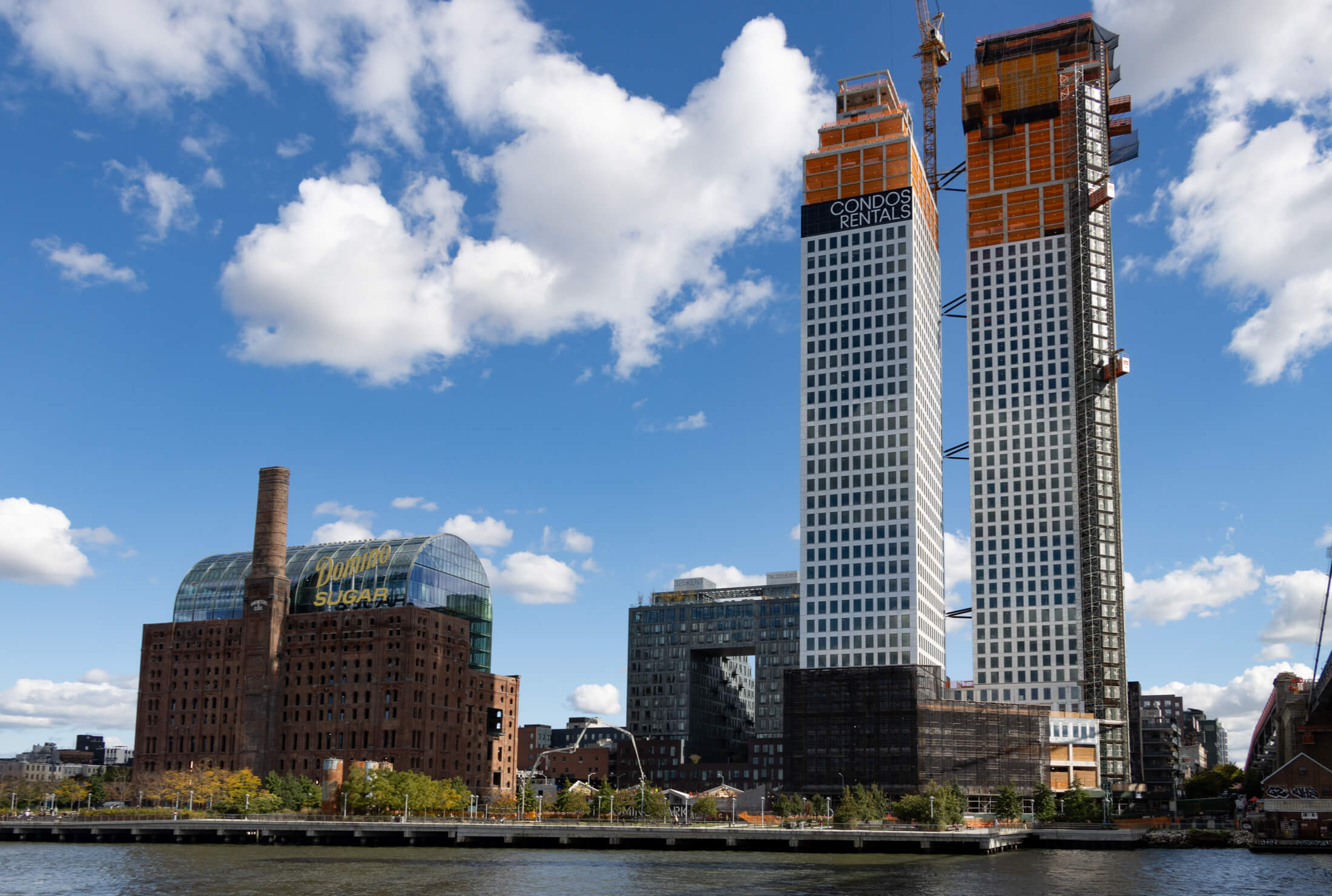 one domino square - view of the two white towers from the water