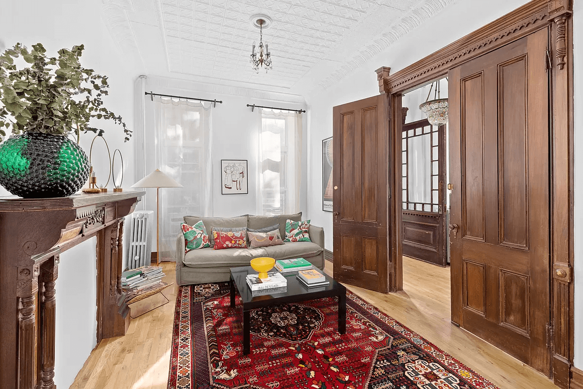 parlor with mantel and moldlings