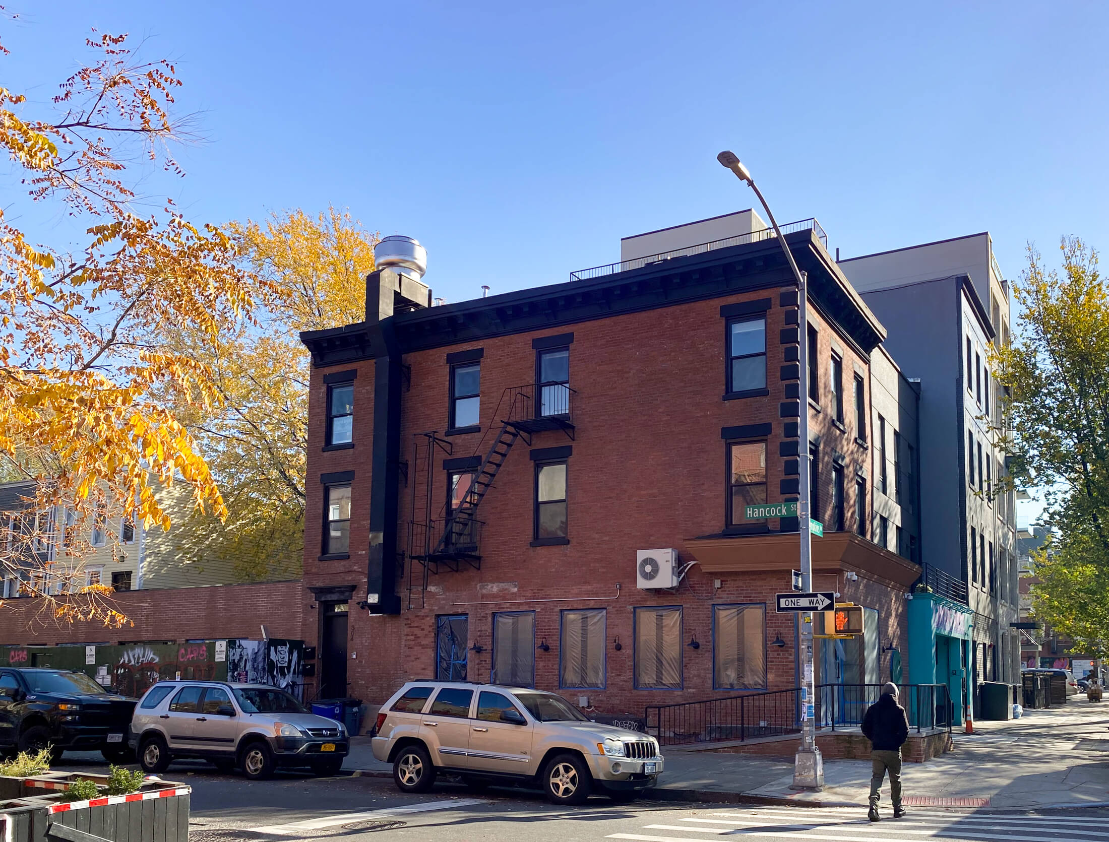 corner showing the brick building