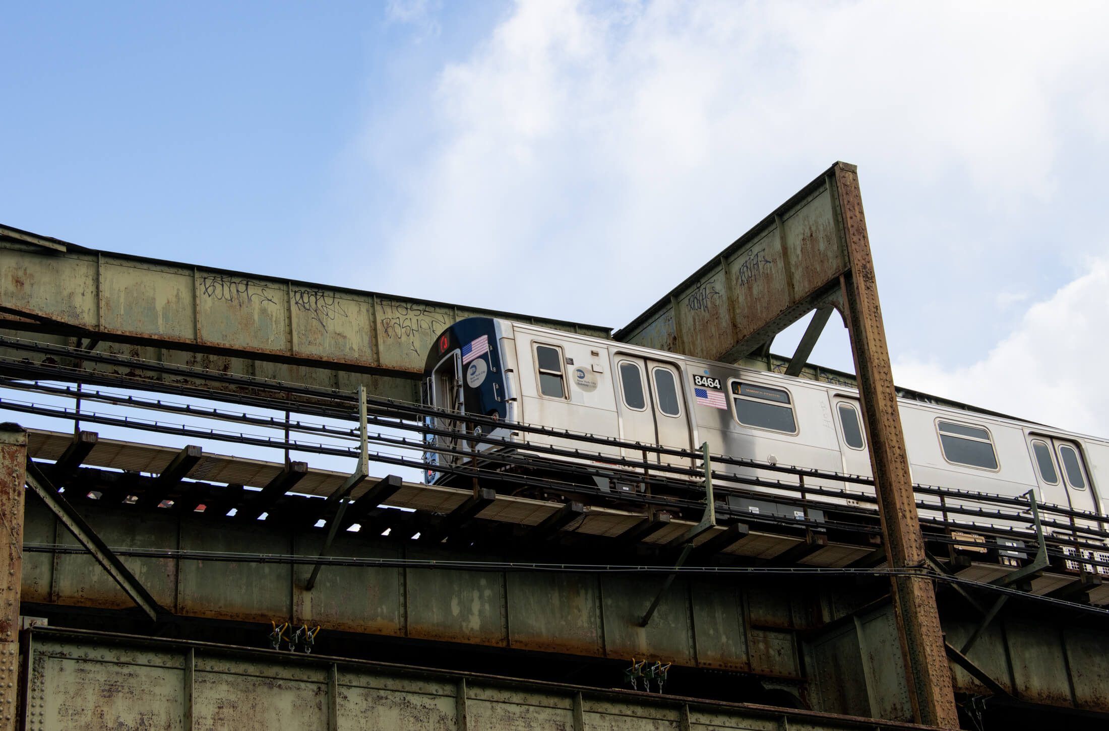 elevated tracks and a train